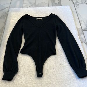 XS black sweater body suit never worn